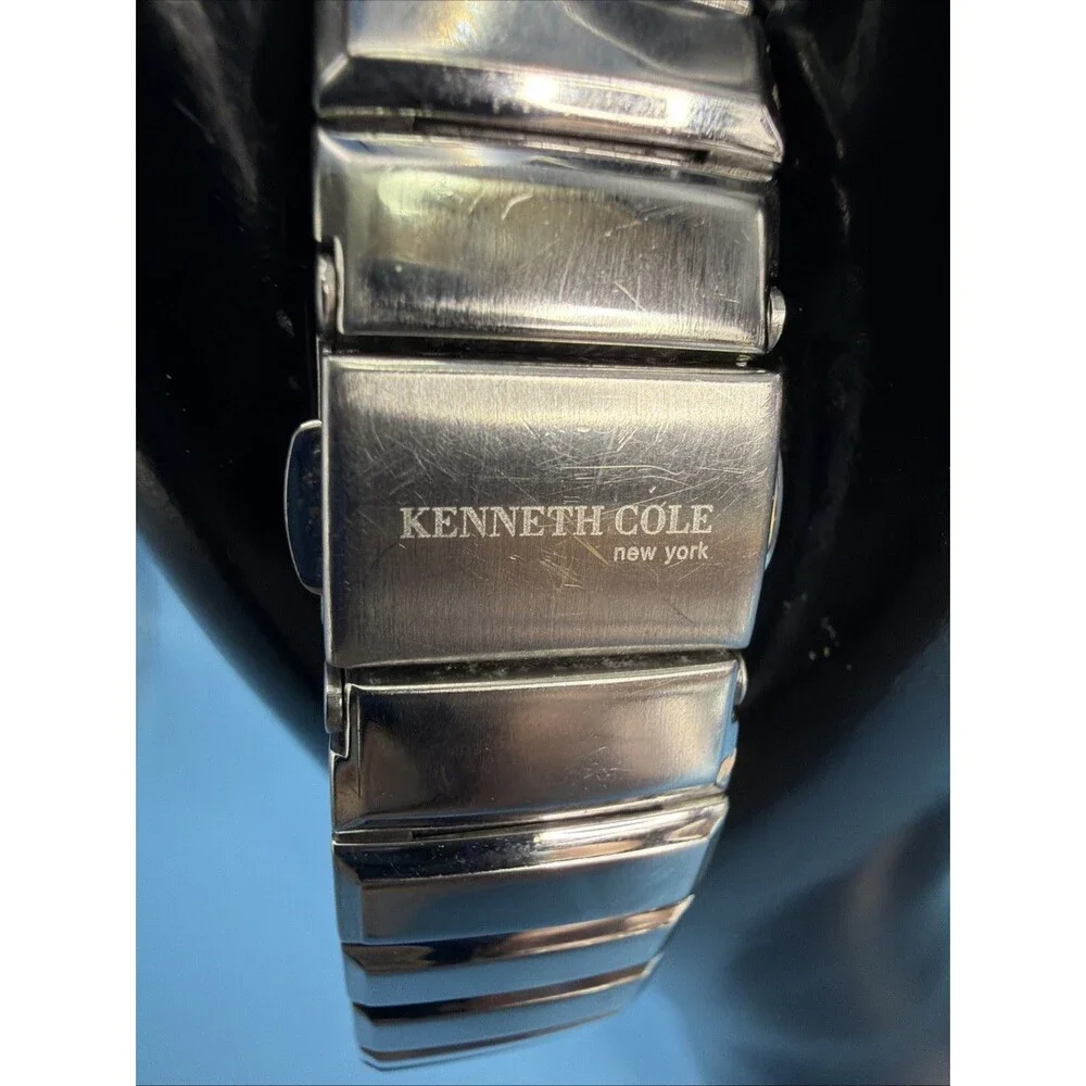 Ladies Kenneth Cole New York Rectangle Silver Tone Black Dial Analog Watch